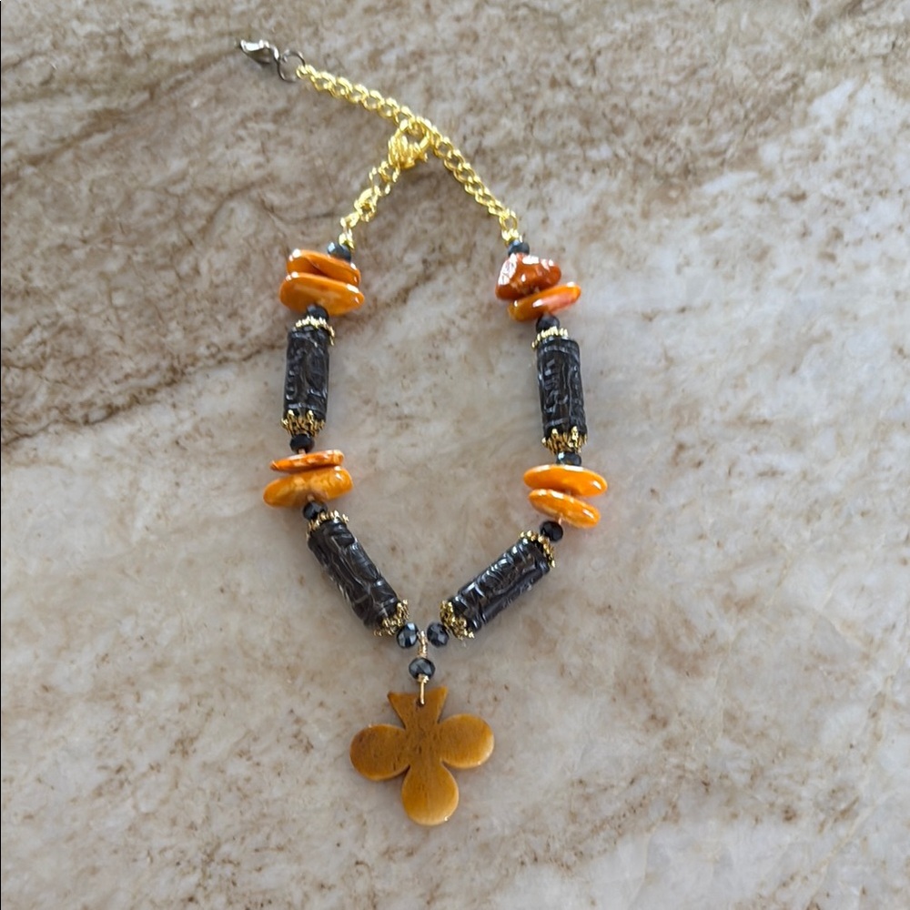 Artisan Orange and Black Necklace with Striking Contrast